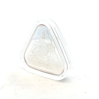 Silver coin weighing 31.8g, unbranded, with detailed surface design and a shiny metallic finish.
