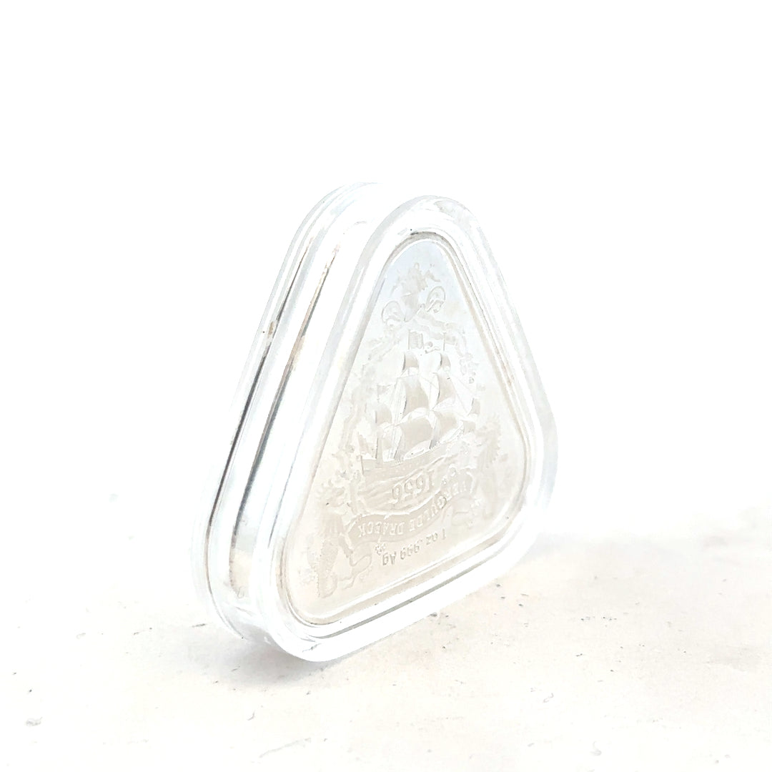 Silver coin weighing 31.8g with detailed design, unbranded, shown on a plain background.