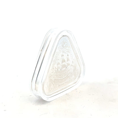 Silver coin weighing 31.8g with detailed design, unbranded, shown on a plain background.