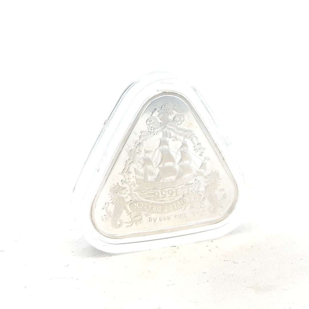 Silver coin weighing 31.8g with a detailed design, unbranded, shown from a side view on a plain background.
