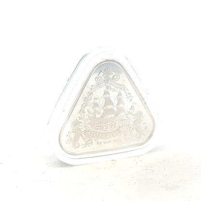 Silver coin weighing 31.8g with a detailed design, unbranded, shown from a side view on a plain background.