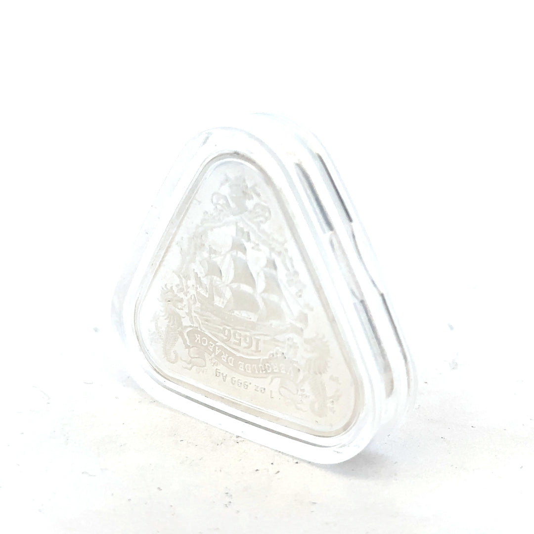 Silver coin weighing 31.8g with detailed design, unbranded, shown on a plain background, close-up view highlighting its surface.
