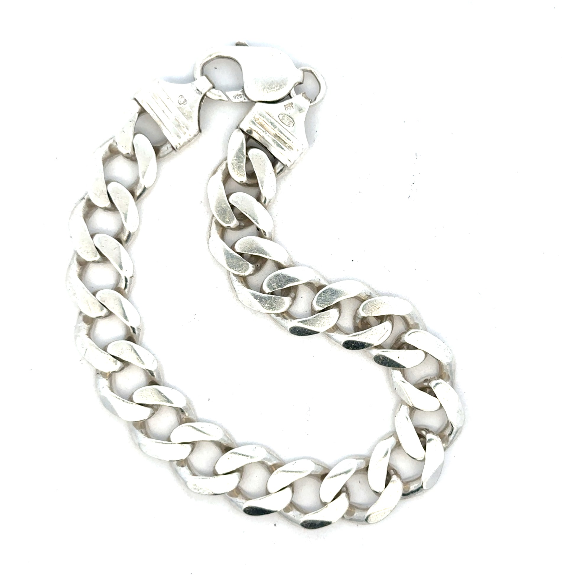 Silver curb bracelet weighing 33.7g with a sleek design, featuring interconnected links, ideal for stylish jewelry collection.