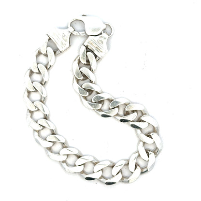Silver curb bracelet weighing 33.7g with a sleek design, featuring interconnected links, ideal for stylish jewelry collection.