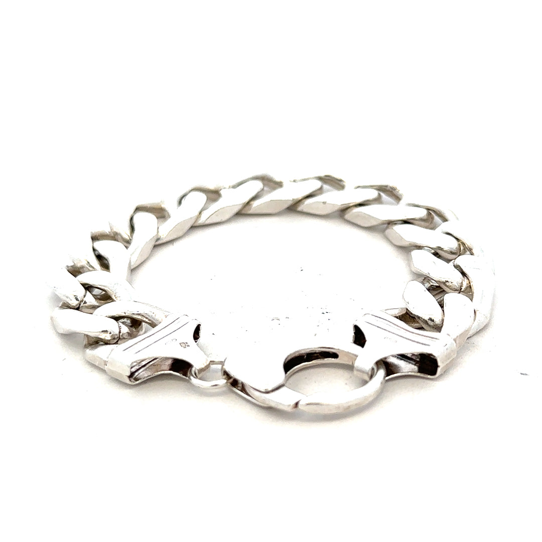 Silver curb bracelet weighing 81.4g with a classic chain design, unbranded jewelry accessory shown in the image.