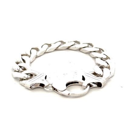 Silver curb bracelet weighing 81.4g with a classic chain design, unbranded jewelry accessory shown in the image.
