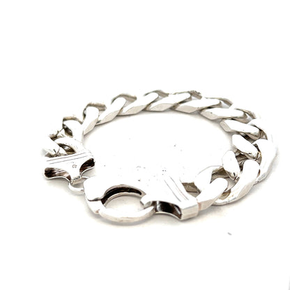 Silver curb bracelet weighing 81.4g with a sleek, interlinked chain design, unbranded, shown against a neutral background.