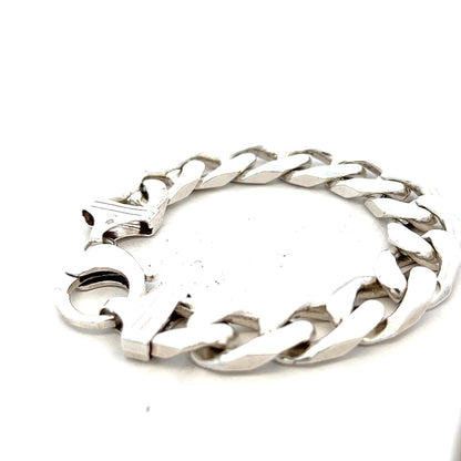 Silver curb bracelet weighing 81.4g, featuring a sleek chain design, crafted by an unbranded jewelry maker.