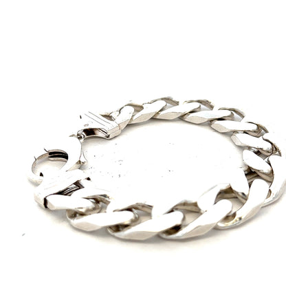 Silver curb bracelet weighing 81.4g, unbranded jewelry piece with a sleek, classic chain design.