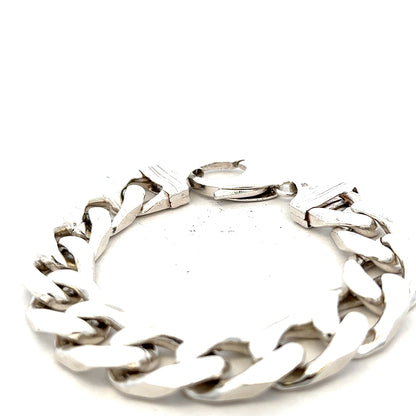 Silver curb bracelet weighing 81.4g with a classic chain design, shown on a plain background.