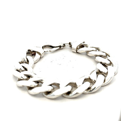 Silver curb bracelet weighing 90.1g, featuring a sleek chain design with a polished finish, suitable for stylish everyday wear.
