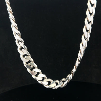 Silver curb chain weighing 109.9g with a sleek design, displayed on a plain background.