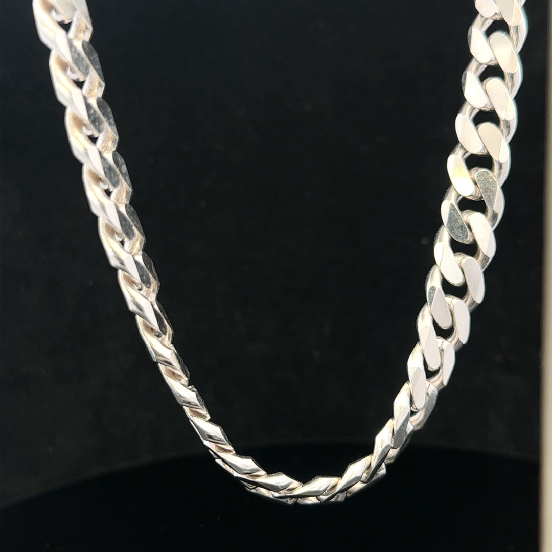 Silver curb chain weighing 109.9g, showcasing a close-up of the unbranded jewelry with detailed links and a polished finish.