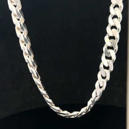 Silver curb chain weighing 109.9g, showcasing a close-up of the unbranded jewelry with detailed links and a polished finish.