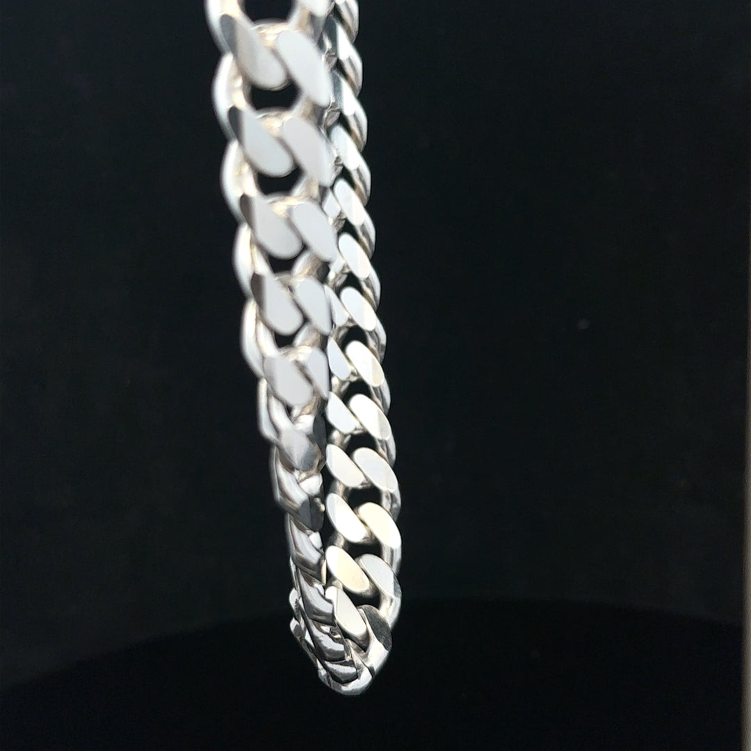 Silver curb chain weighing 109.9g, unbranded jewelry chain with a classic curb link design, displayed on a neutral background.