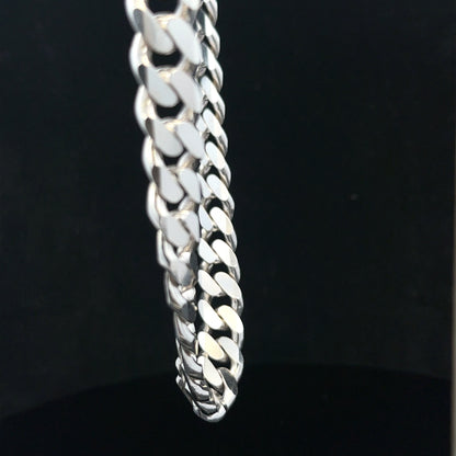 Silver curb chain weighing 109.9g, unbranded jewelry chain with a classic curb link design, displayed on a neutral background.
