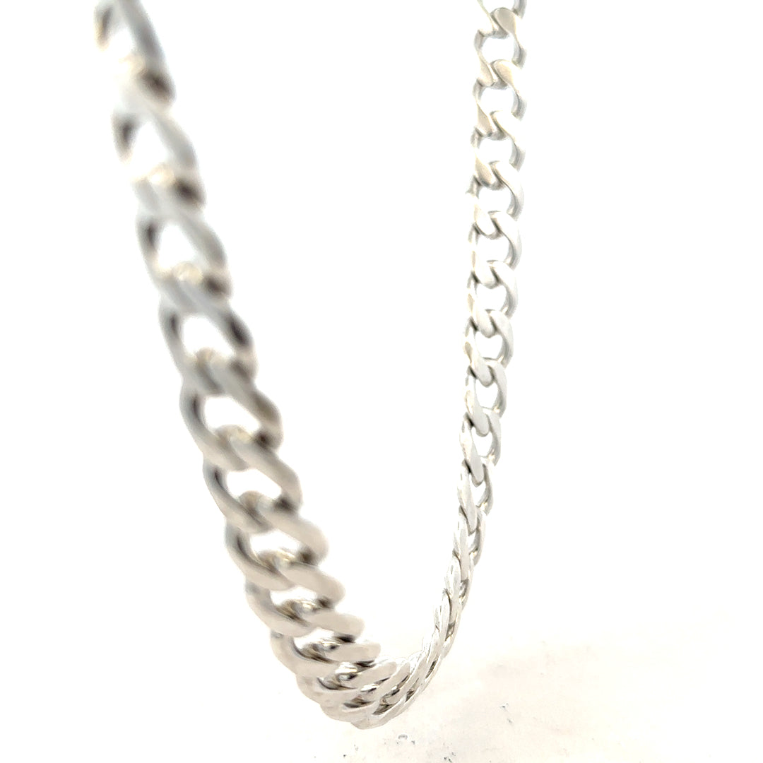 Silver curb chain weighing 115.4g with a classic design, featuring interlinked oval links, unbranded jewelry accessory.
