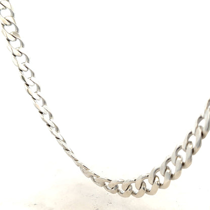Silver curb chain weighing 115.4g with a sleek design, featuring interconnected oval links, ideal for jewelry or accessories.