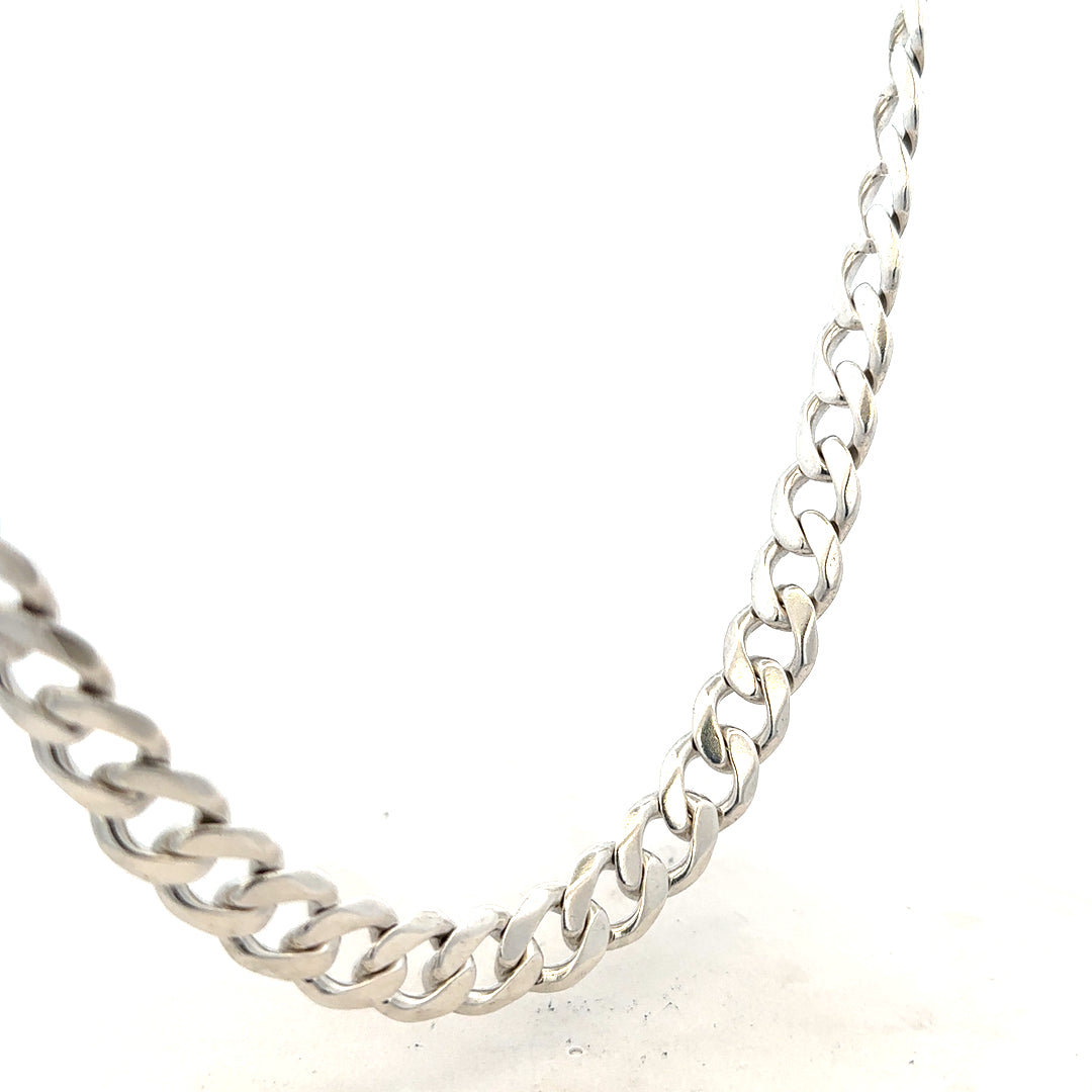 Silver curb chain weighing 115.4g with a classic link design, shown in a close-up image highlighting its polished finish.