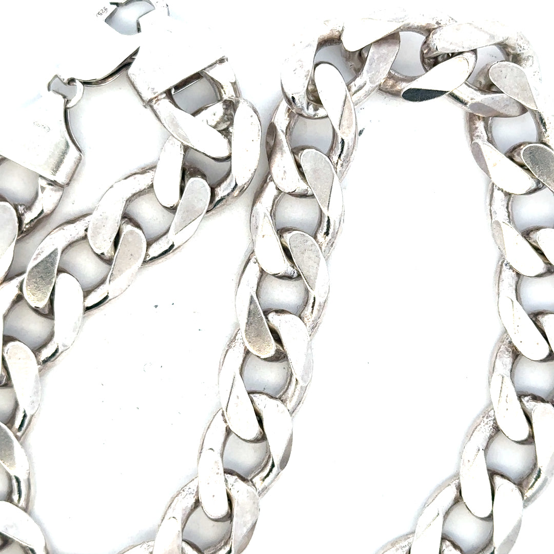 Silver curb chain weighing 134.5g, unbranded jewelry chain with a sleek, classic design and polished finish.