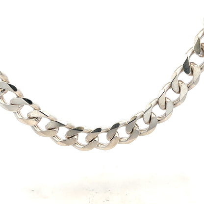 Silver curb chain weighing 146.6g with a sleek, polished finish, featuring interconnected oval links.