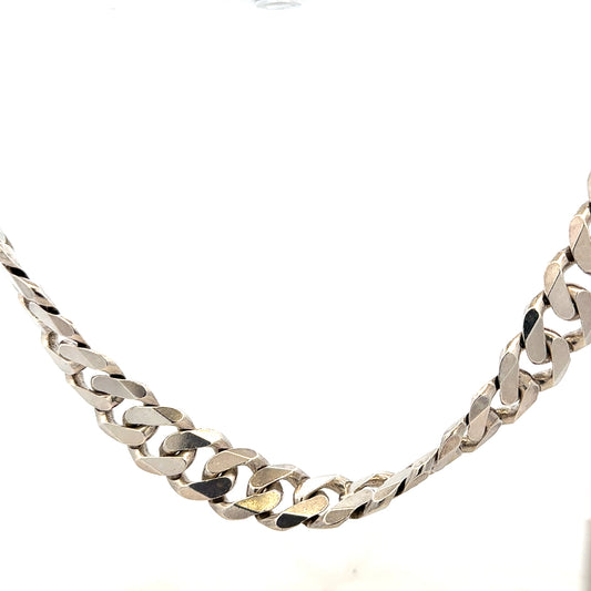 Silver curb chain weighing 148.4g, featuring a classic link design, displayed on a neutral background.