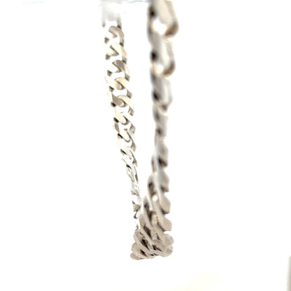 Silver curb chain weighing 148.4g, featuring classic linked design, perfect for jewelry making or wearing as a statement accessory.