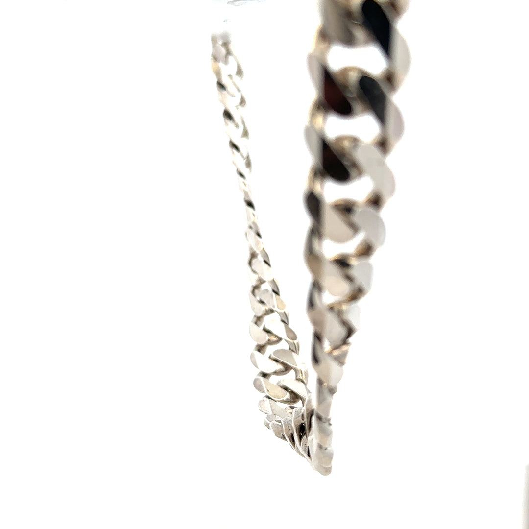 Silver curb chain weighing 148.4g, unbranded jewelry chain with interlocking links, displayed against a neutral background.