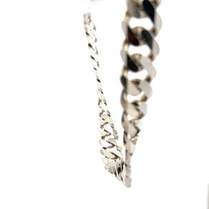 Silver curb chain weighing 148.4g, unbranded jewelry chain with interlocking links, displayed against a neutral background.