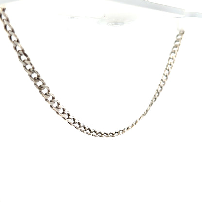 Silver curb chain weighing 16.2g, unbranded jewelry accessory with a classic linked design, shown in a close-up view.