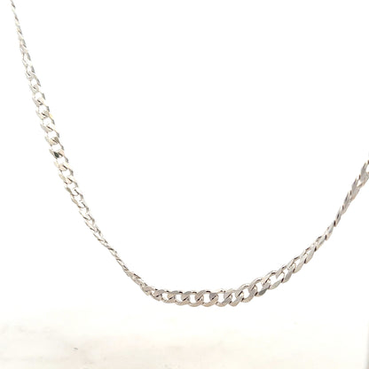 Silver curb chain weighing 16.4g, featuring interconnected links, designed for jewelry and fashion accessories.