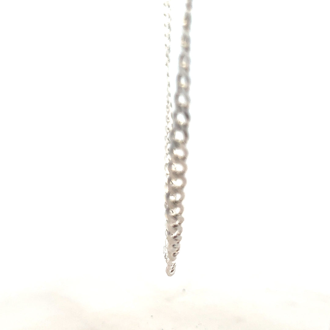 Silver curb chain weighing 16.4g, featuring interlocking links, designed for jewelry, unbranded, with a polished finish.