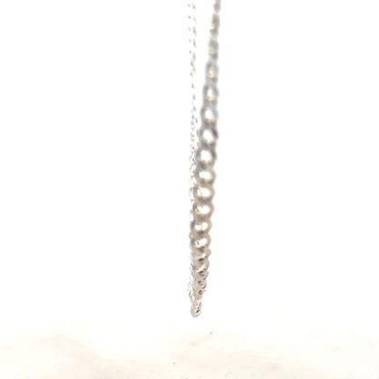 Silver curb chain weighing 16.4g, featuring interlocking links, designed for jewelry, unbranded, with a polished finish.