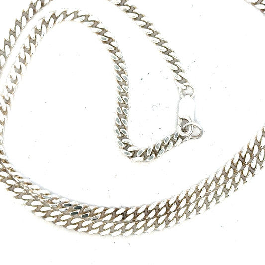 Silver curb chain weighing 24.8g, featuring a classic design with interlocking links, suitable for jewelry or accessories.