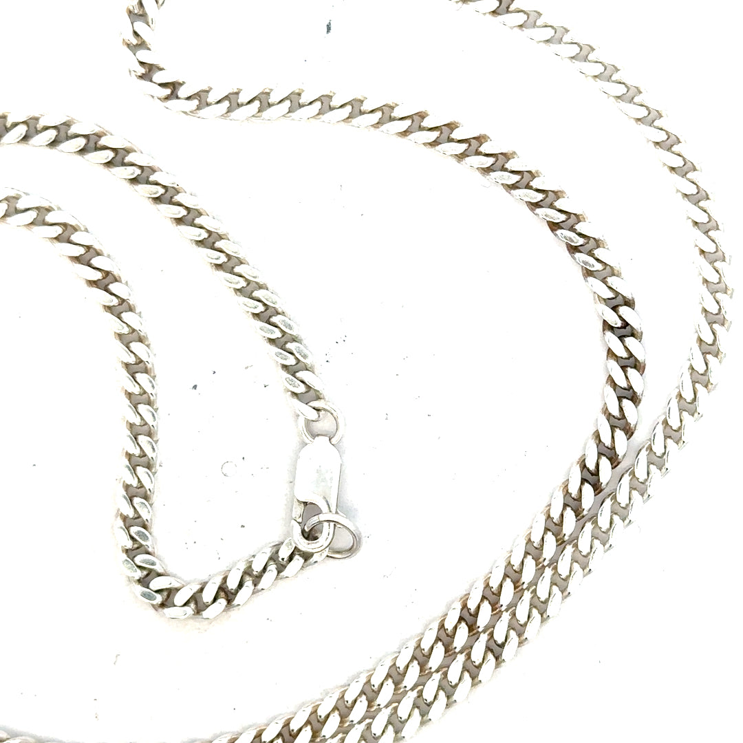 Silver curb chain weighing 24.8g, featuring a classic linked design, perfect for jewelry or layering.