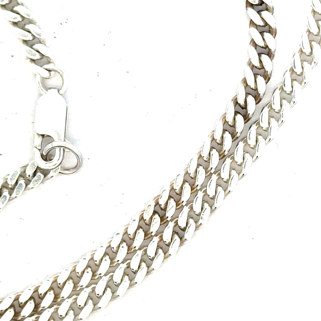 Silver curb chain weighing 24.8g, showcasing its sleek links and polished finish, perfect for jewelry or accessories.