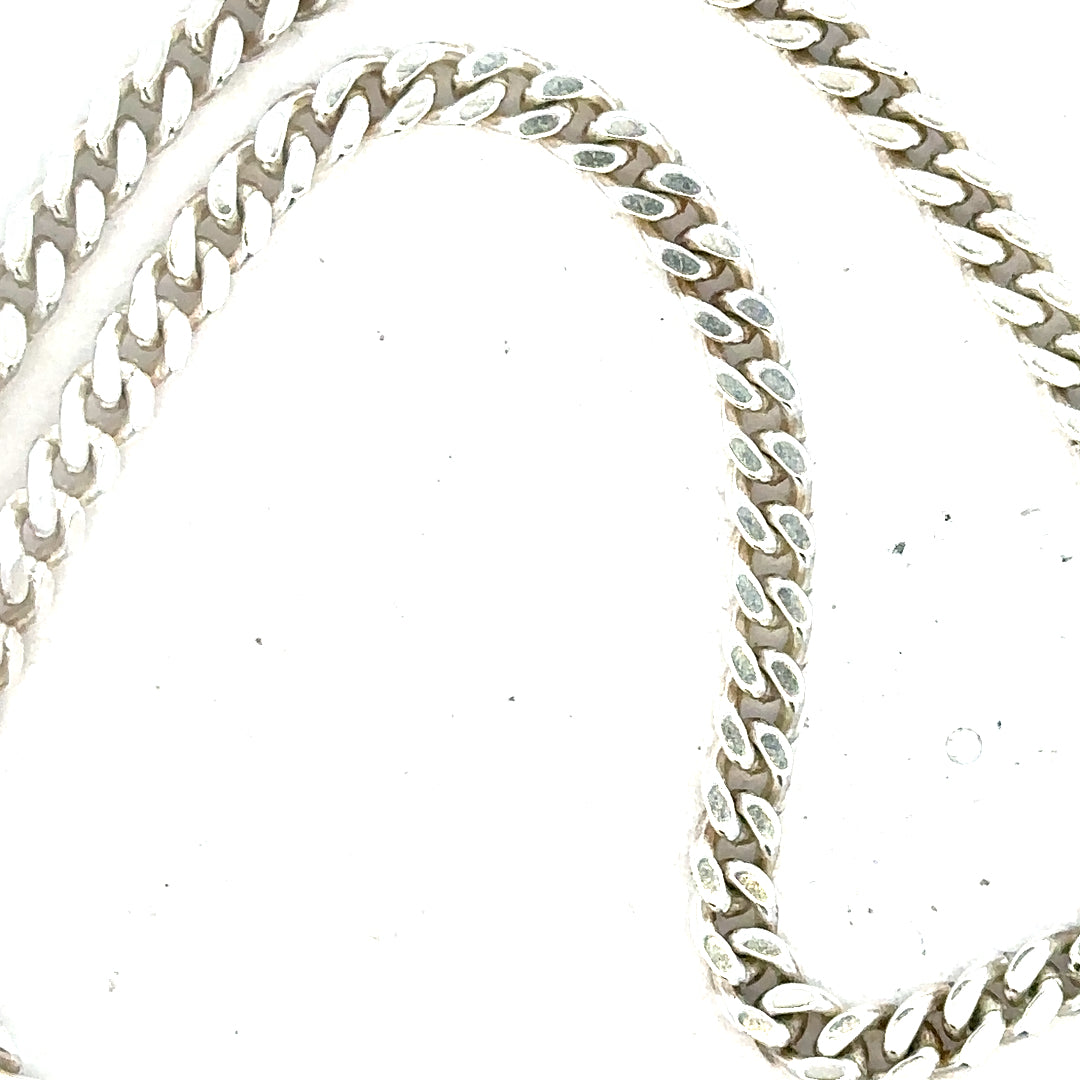 Silver curb chain weighing 24.8 grams, featuring a classic linked design, made by an unbranded manufacturer.