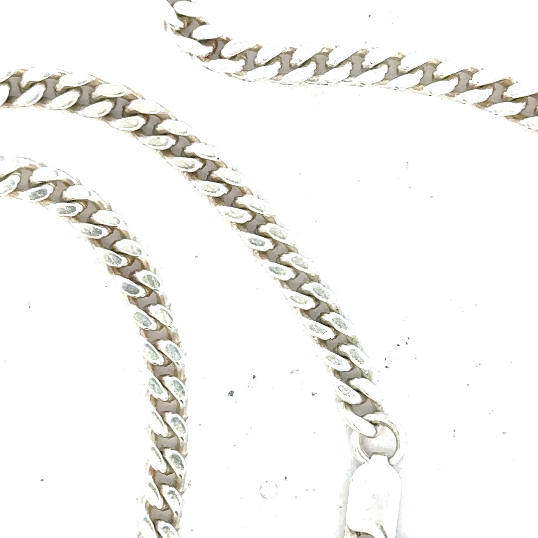 Silver curb chain weighing 24.8g with a classic design, displayed on a neutral background.