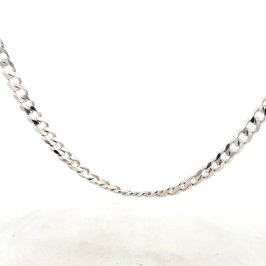 Silver curb chain weighing 27.8g, featuring a classic link design, suitable for jewelry or accessory use.