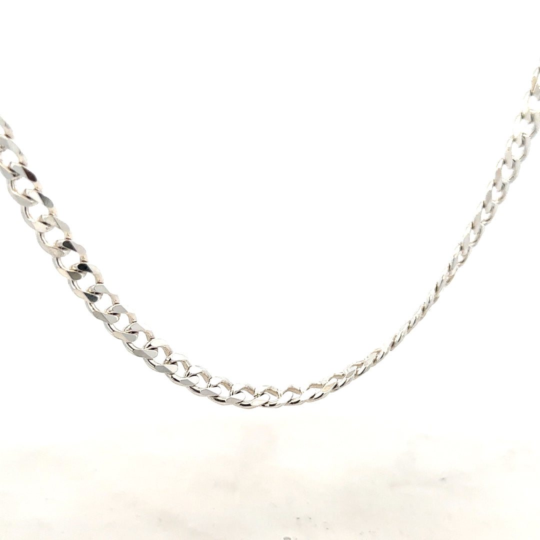 Silver curb chain weighing 27.8g with a classic design, showcased on a plain background.