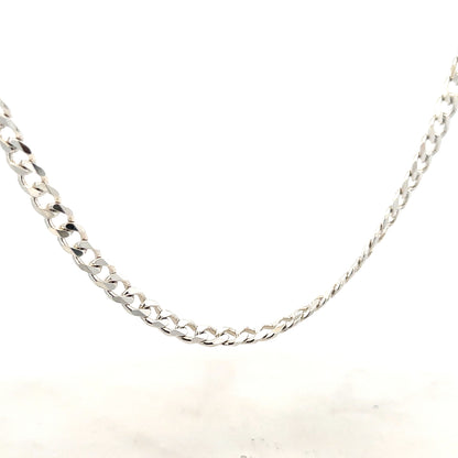 Silver curb chain weighing 27.8g with a classic design, showcased on a plain background.