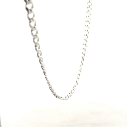 Silver curb chain weighing 27.8g, featuring a classic design with interlocking links, ideal for jewelry or accessories.