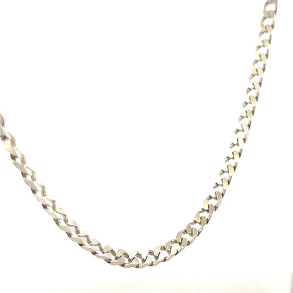 Silver curb chain with a sturdy link design, weighing 28.8g, perfect for jewelry accessories and layering.