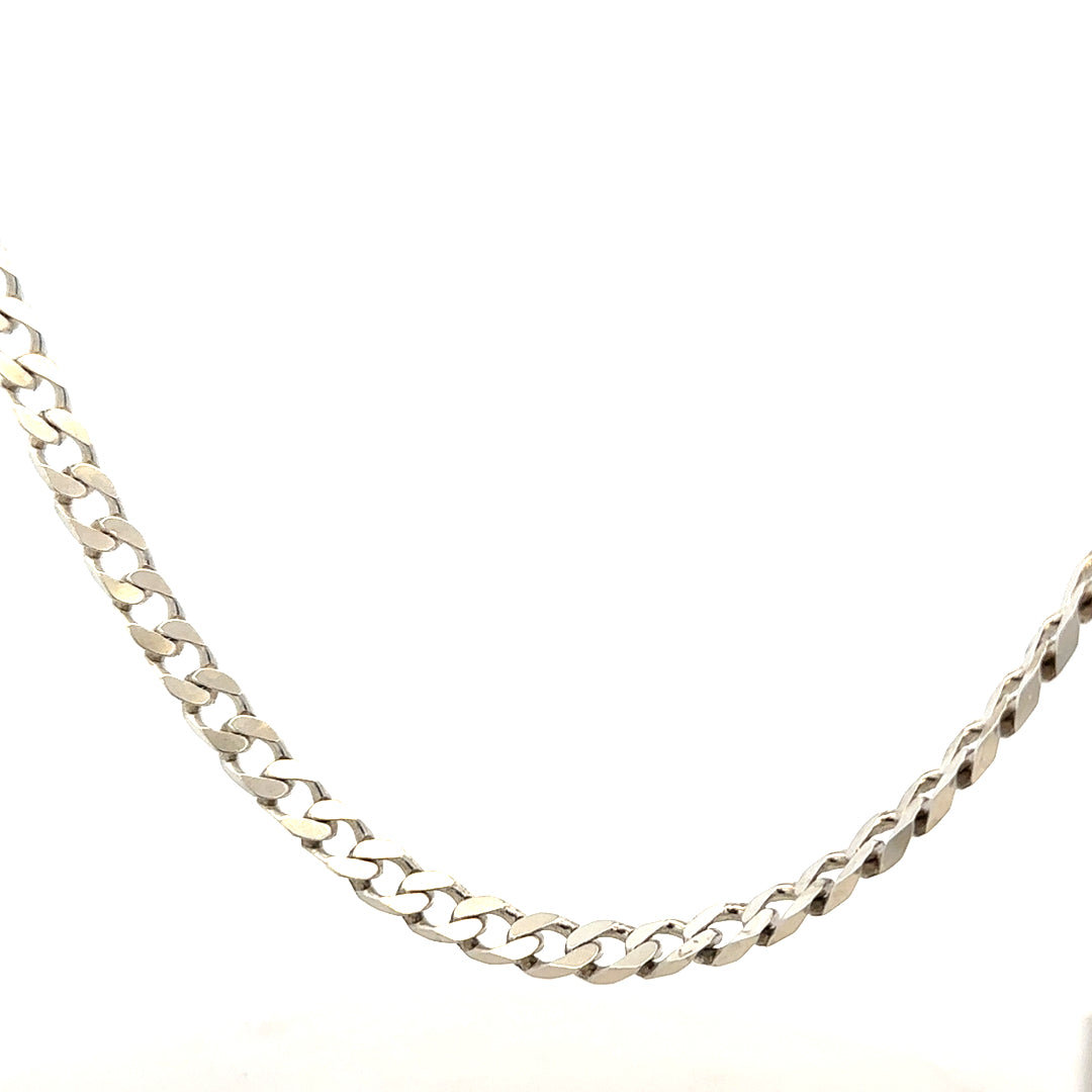 Silver curb chain weighing 28.8g, featuring a classic design with interlocking links, ideal for jewelry or accessories.