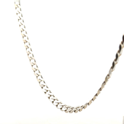 Silver curb chain weighing 28.8g, featuring a classic linked design, ideal for necklaces or layered jewelry.