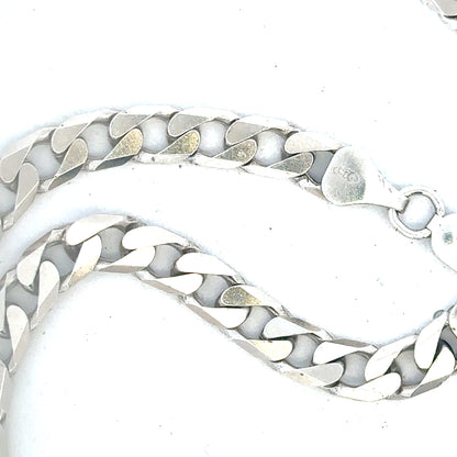 Silver curb chain weighing 31.3g, featuring interlocking links, displayed on a neutral background.