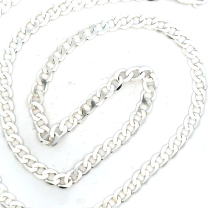 Silver curb chain weighing 34.5g, featuring interlinked oval links, crafted for a sleek, stylish jewelry look.