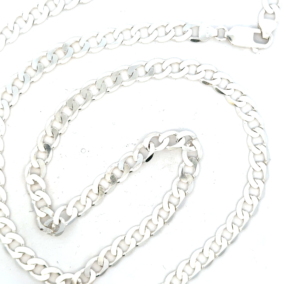 Silver curb chain weighing 34.5g, unbranded jewelry accessory, close-up of the polished silver chain links.