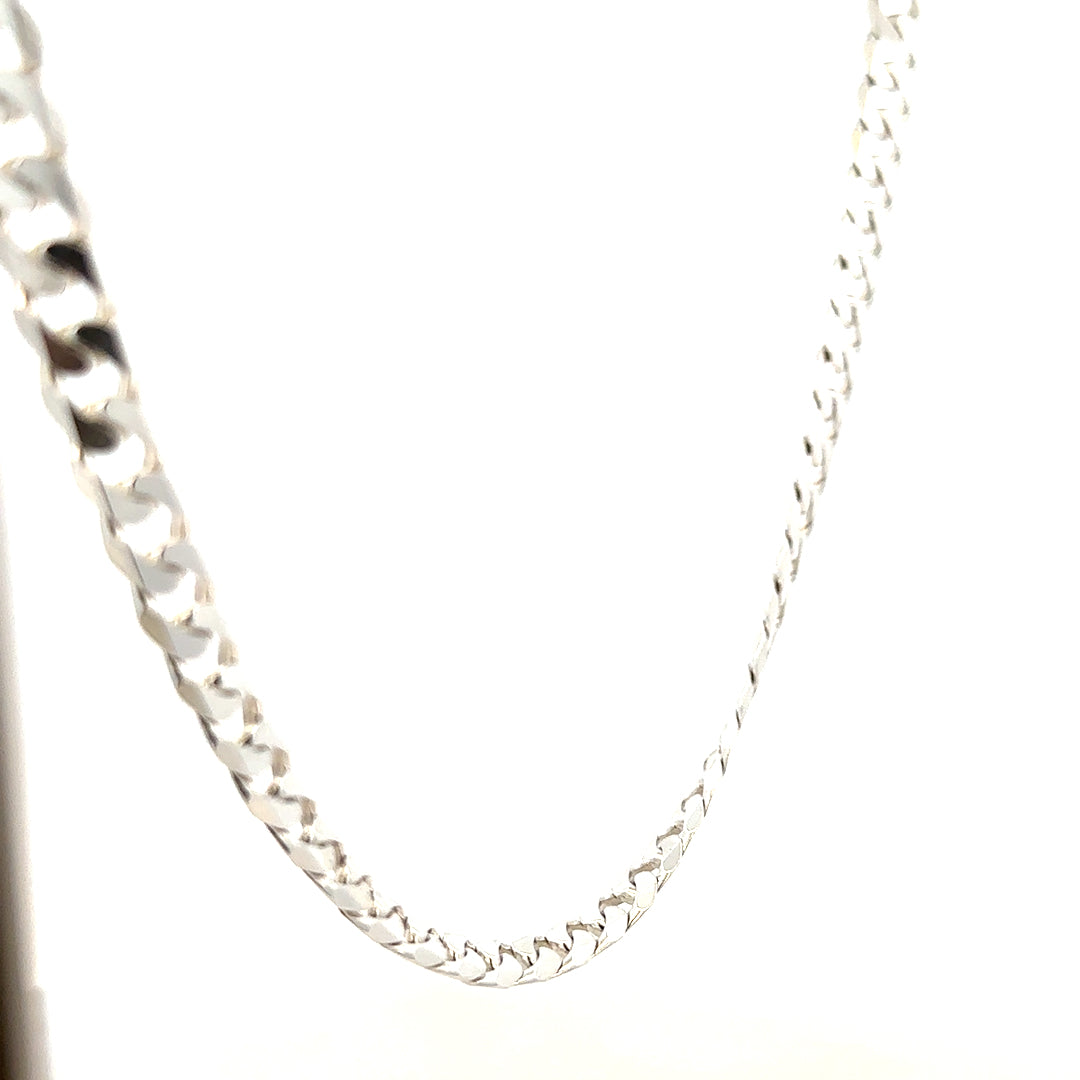 Silver curb chain weighing 44.6g with a sleek, polished finish, featuring interlocking links in a classic jewelry style.