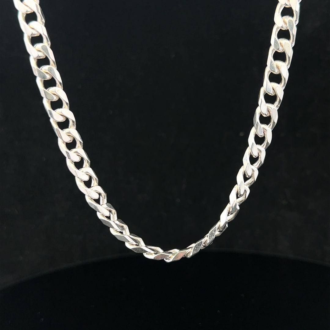 Silver curb chain weighing 48.8g, featuring classic links, perfect for jewelry design or wear.